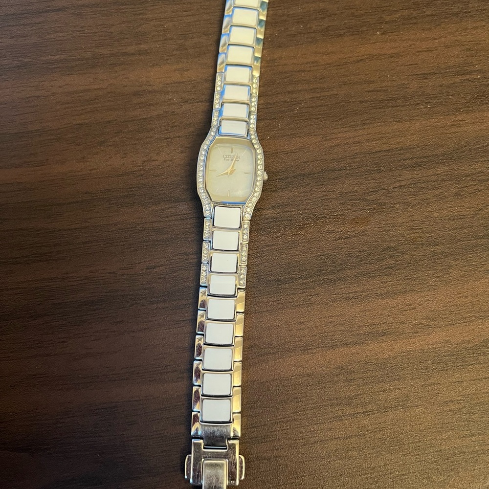 White womens eco drive Swarovski watch